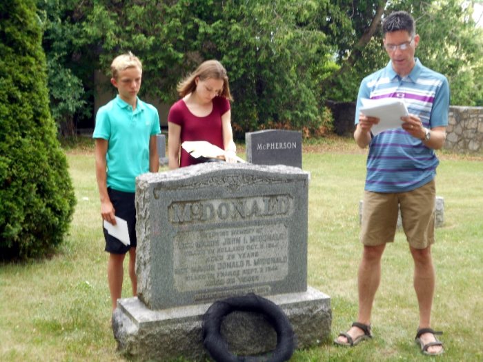 Brent McDonald, reader, with son James and daughter Abigail.