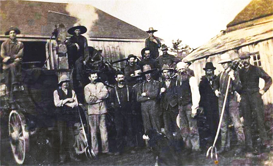 Mr. Worthington threshing at Ord's